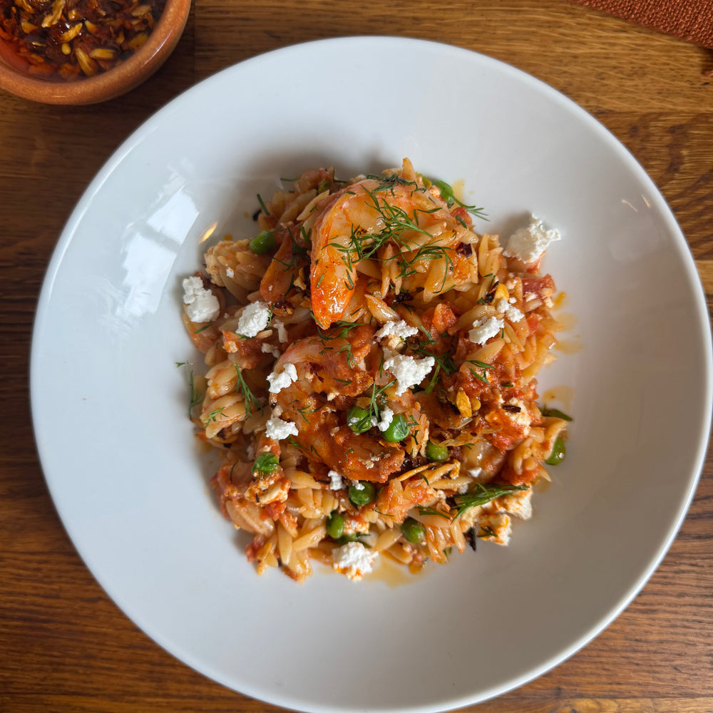 Delicious shrimp and orzo dish with Calabrian chiles and peas.